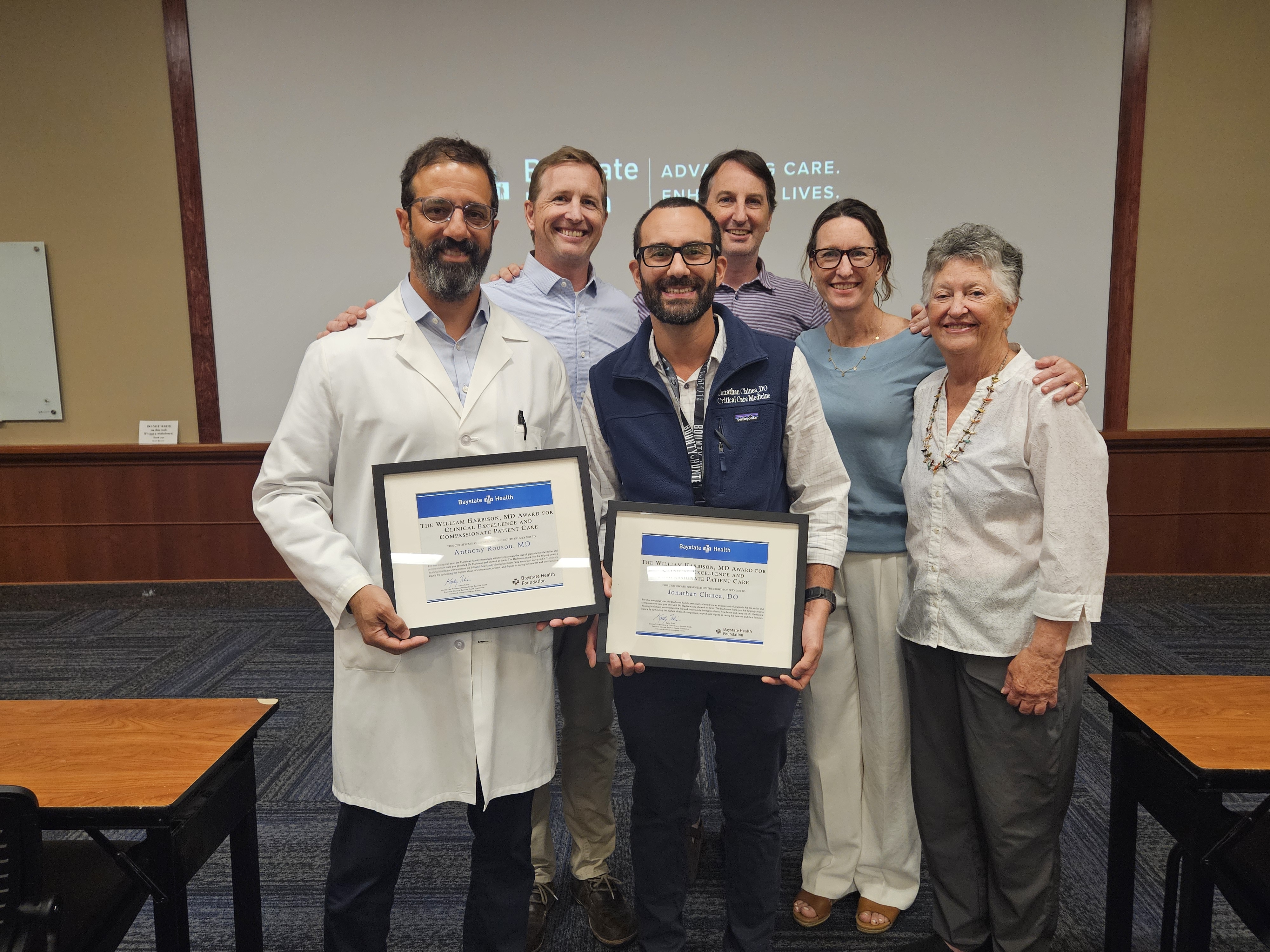 Left to right:&nbsp; Dr. Anthony Rousou (left) and Dr. Jonathan Chinea (right) celebrating with the Harbison Family – Rick, Chris, Heidi and Marsha.&nbsp;